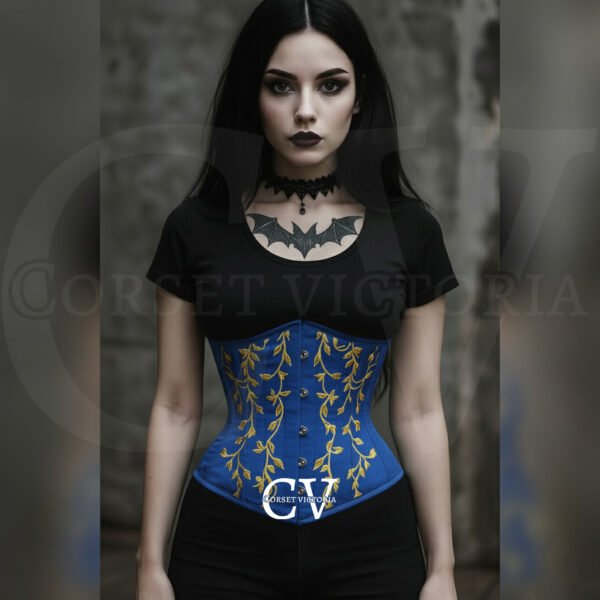 Woman in gothic style wearing a Blue corset with Golden embroidery, paired with dark makeup and bat tattoo, Halloween fashion.